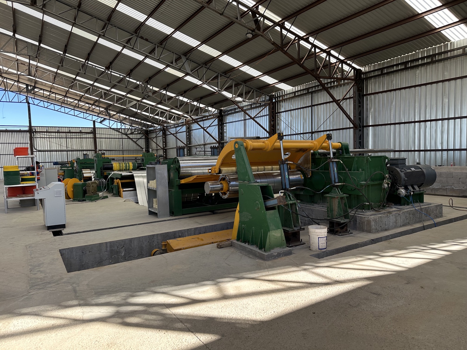 Roll-forming and fabrication equipment at the Cal Steel facility.