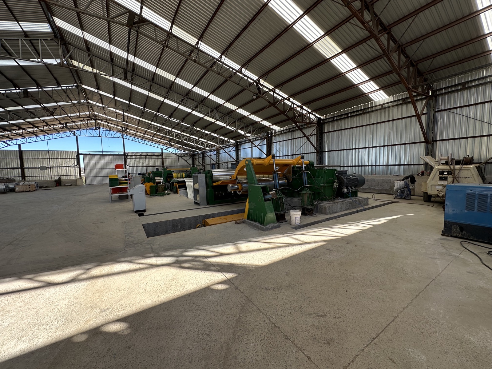 Roll-forming and fabrication equipment at the Cal Steel facility.