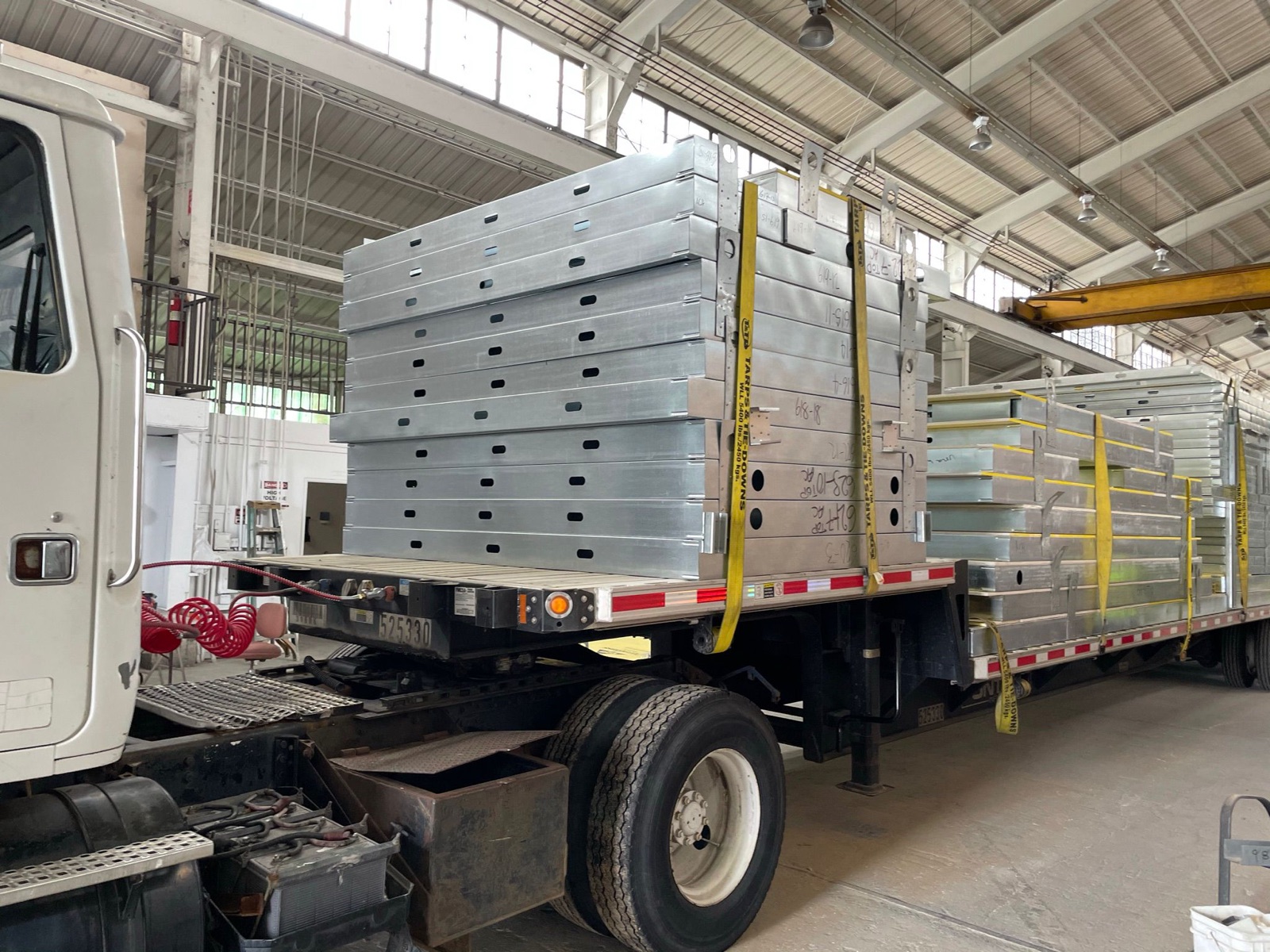 Light gauge steel profiles, studs, and panelized assemblies at the Cal Steel facility.